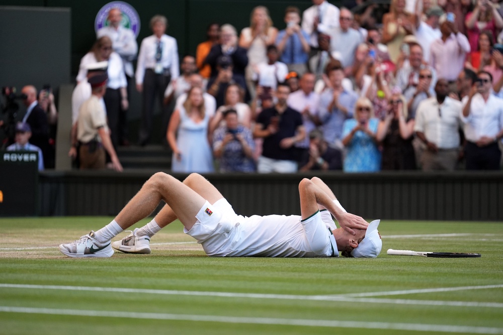 Jannik Sinner lies on his back after beating Alexander Zverev (Mike Egerton/PA) (PA Wire)