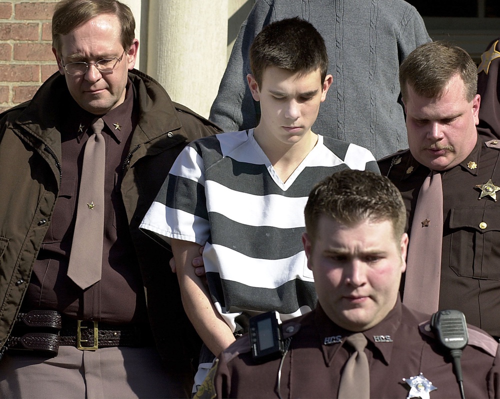 James Parker is led February 20, 2001 to the Henry County Courthouse in New Castle, Indiana. Parker, a 16 year old from New Hampshire is held in custody with another suspect in connection with the slayings of Dartmouth professors Half and Susanne Zantop (Getty)