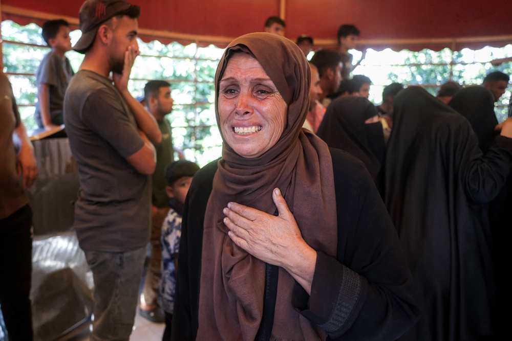 A mourner reacts during the funeral of a victim who was killed in a reported Israeli strike on a tent according to medics, at Nasser Medical Complex in Khan Yunis in the southern Gaza Strip on July 8, 2026 (AFP/Getty)