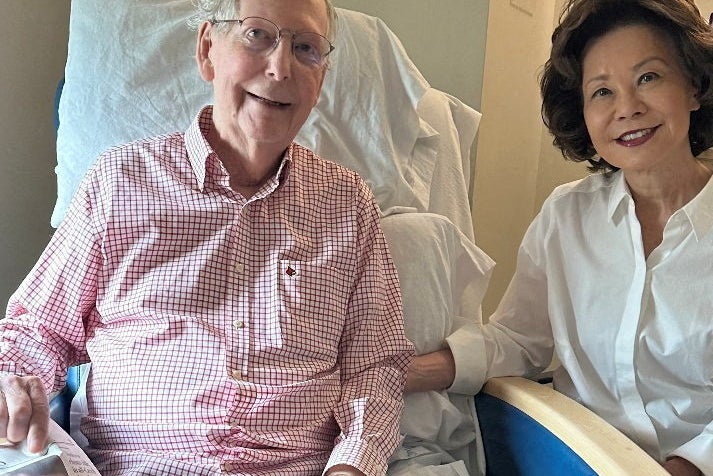 McConnell last posted a health update on July 12, including a picture of himself sitting up in his hospital bed alongside his wife (Reuters)