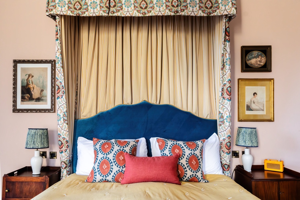 Bedrooms at Cromlix hotel combine bold patterns with vintage furniture (Cromlix)