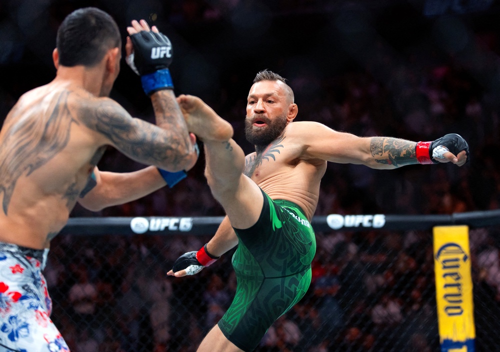 McGregor seemed to hurt himself with his opening strike (Reuters)