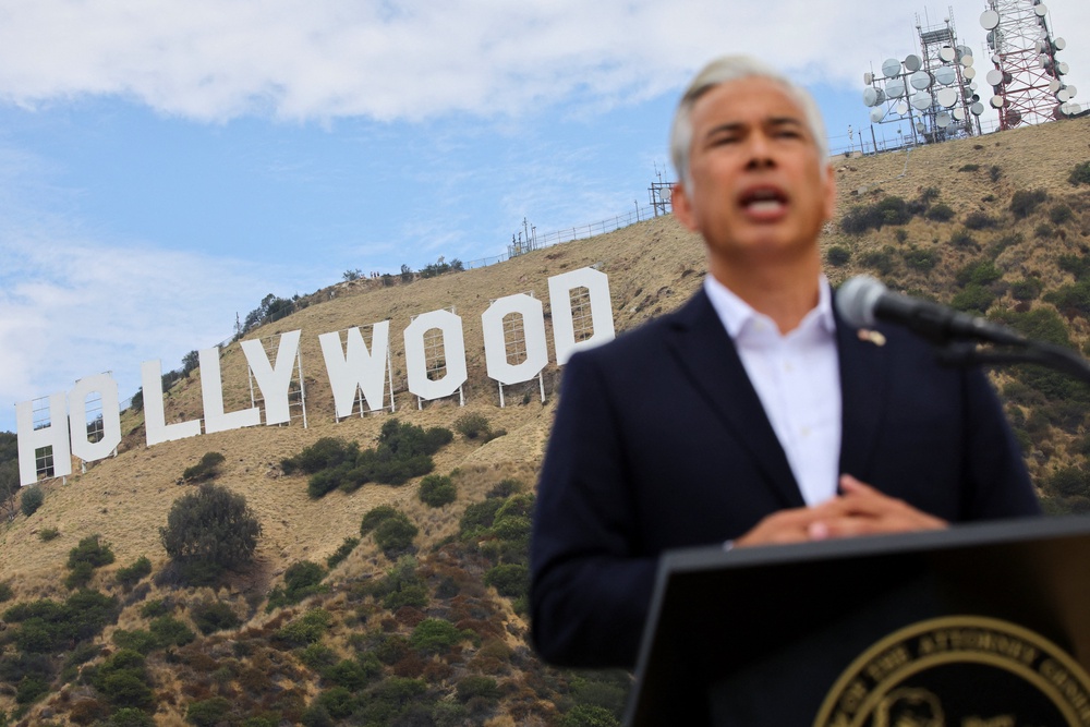 California Attorney General Rob Bonta holds a press conference next to the iconic Hollywood Sign, as he announces California will sue to block Paramount's $110 billion acquisition of Warner Bros. (Reuters)