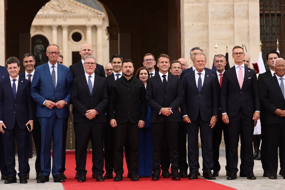 French president Emmanuel Macron, Ukrainian president Volodymyr Zelensky and Sir Keir Starmer with other world leaders in Paris (AP)
