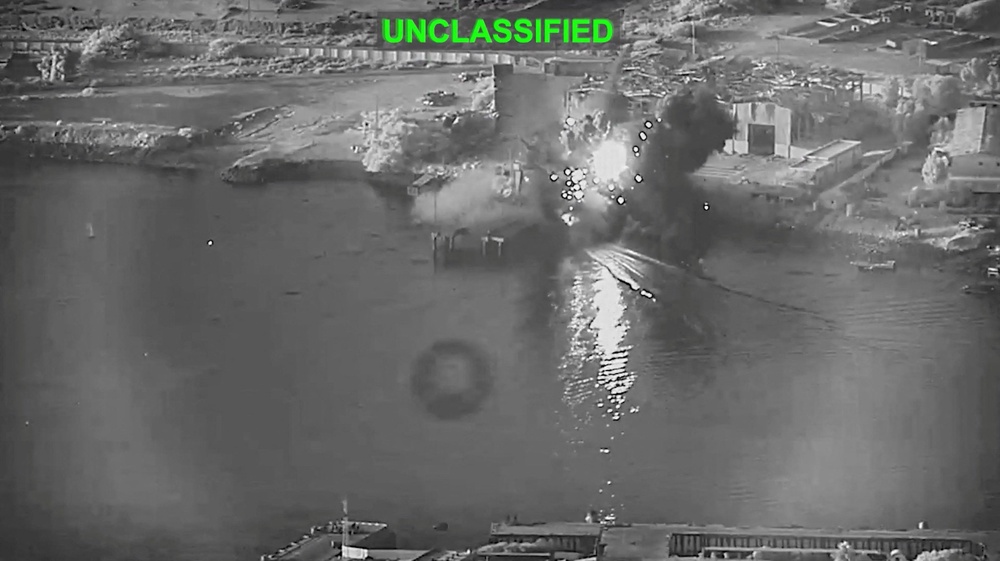 Smoke rises after a US one-way attack surface drone reached its target, a submarine and ship maintenance facility according to US Central Command, in Bandar Abbas, Iran, in this screengrab taken from a video, which was released 13 July 2026 (U.S. Central Command)