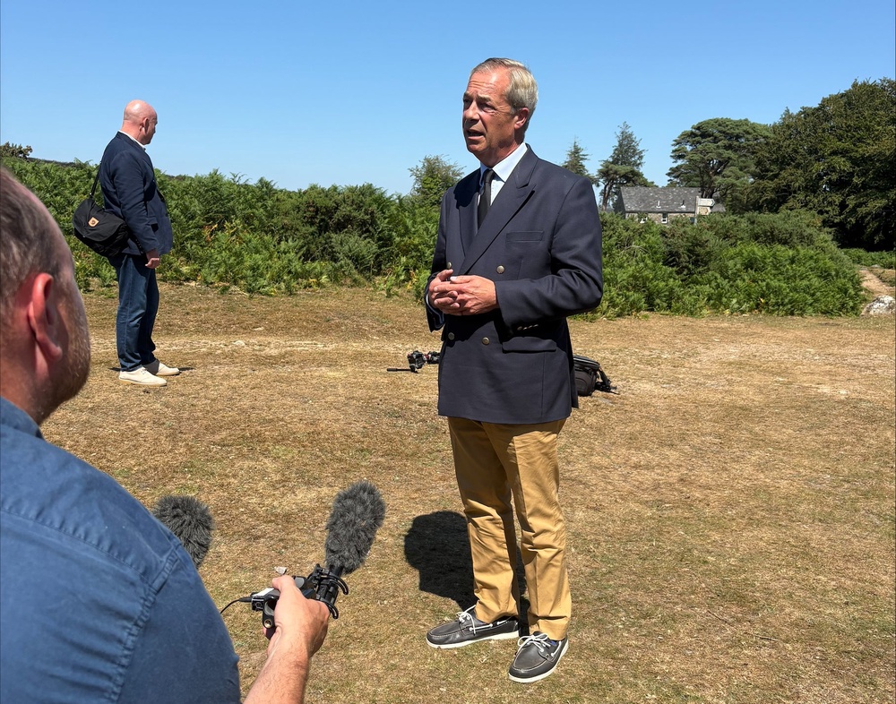 Reform UK leader Nigel Farage speaking to the media after he laid a wreath near to the home of Ann Widdecombe (Eleanor Storey/PA) (PA Wire)