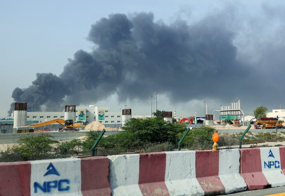 Smoke billows from Jebel Ali port after an Iranian attack in March (Reuters)