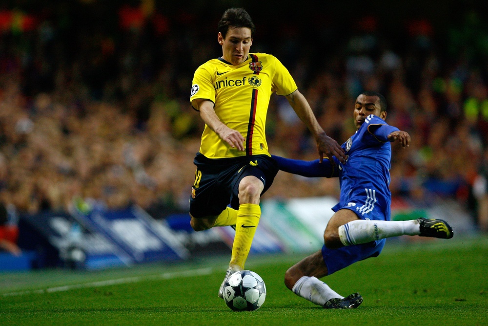 Ashley Cole (right) was one of few to get the better of Lionel Messi in their meetings (Getty)