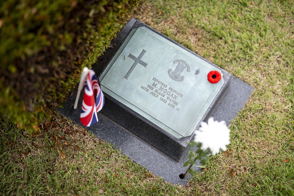 The princess’s single white chrysanthemum at the grave of Private Martin Hogan who died July 14 1952 aged 19 (Jordan Pettitt/PA) (PA Wire)