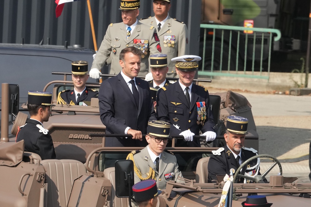 Mr Macron joined General Chief of Staff of the French armed Forces Fabien Mandon during a review of troops (AP) (AP)