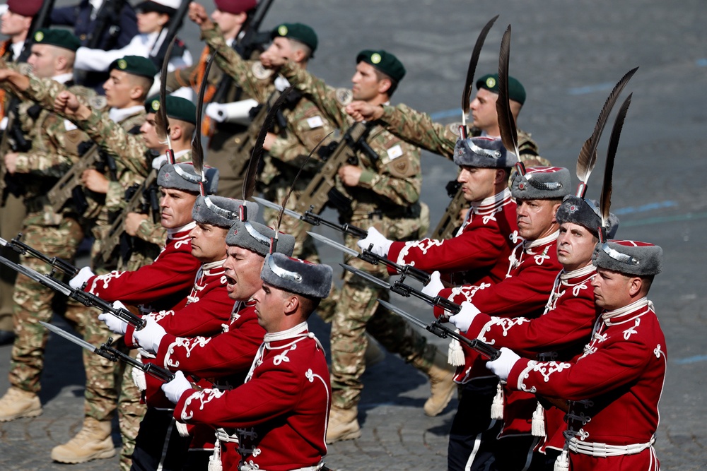Bulgarian troops march with soldiers from countries of the Coalition of the Willing during the annual Bastille Day military parade on the Champs-Elysees avenue in Paris (Reuters)