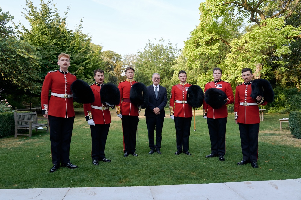 Prime Minister Keir Starmer meets with the British Army's Grenadier Guards at the British Residence on July 14, 2026 in Paris (Getty)