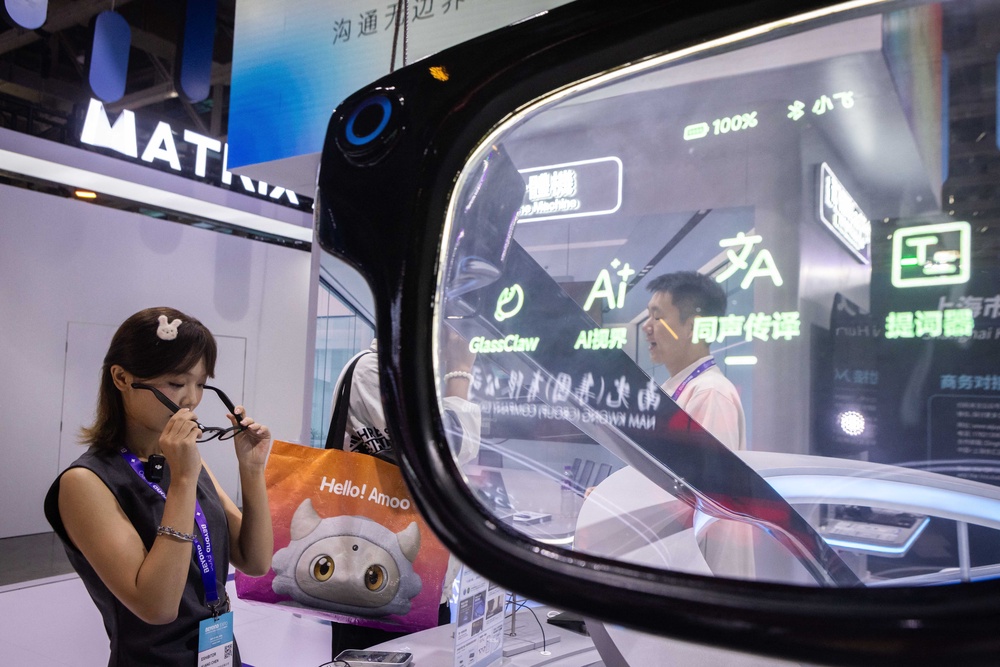 A visitor tests AI smart glasses during the Beyond Expo technology exhibition in Macau on May 29, 2026. (Photo by Eduardo Leal / AFP via Getty) (AFP/Getty)