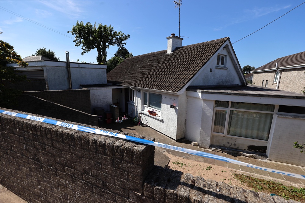 A police cordon at the scene in the Old Cullybackey Road area of Ballymena, Co Antrim (Liam McBurney/PA) (PA Wire)
