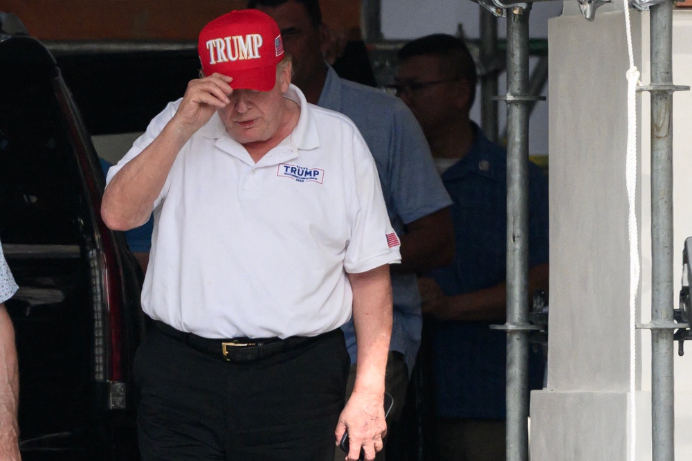 Trump golfed at the Virginia club this weekend, which was hit with a slew of health code violations. The club dismissed the report as 'politically motivated' (AFP/Getty)