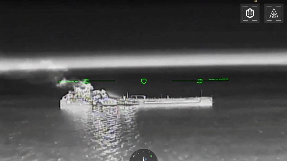 Drone footage shows fire and smoke rising from, what the Rostov region Governor said, was an empty oil tanker, following Ukraine's overnight drone attacks on Russia (Reuters)