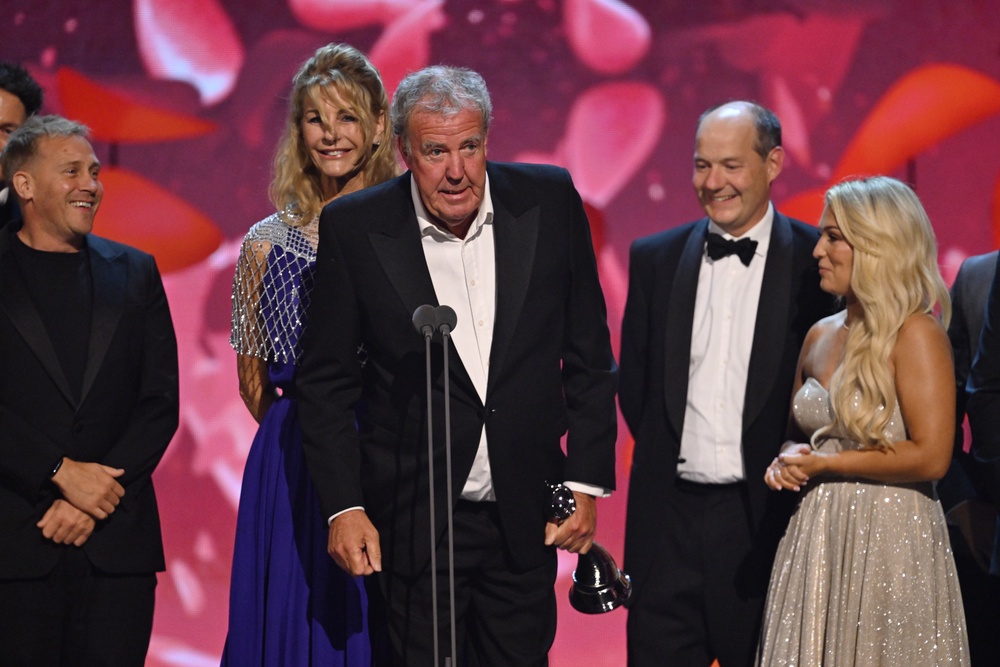 Kit Lynch-Robinson, Lisa Hogan, Jeremy Clarkson, Charlie Ireland and Harriet Cowan accept the Factual Entertainment Award for ‘Clarkson’s Farm’ during the 2025 NTAs (Getty)