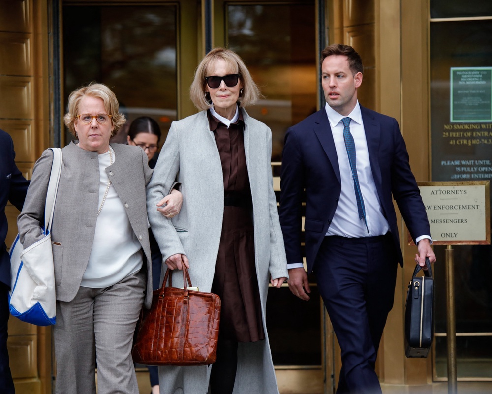 Carroll (pictured center) with her attorney Roberta Kaplan (pictured left) during the 2023 sexual abuse and defamation trial (AFP/Getty)