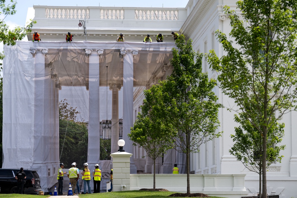 The administration has yet to disclose the cost of the president’s latest renovation project but ‘security enhancements’ are being made to the building’s doors (AFP/Getty)