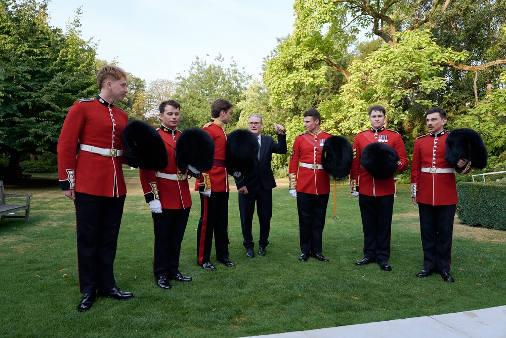 Sir Keir Starmer met Grenadier Guards at the British Residence in Paris on Tuesday ahead of the Bastille Day events (Pierre Crom/PA) (PA Wire)