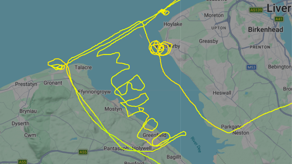 The phrase was skywritten over the water between Talacre and Greenfield (Flightradar 24)