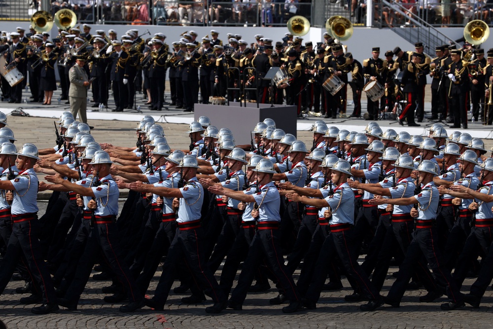 Members of the firefighter brigade of Paris march during the annual Bastille Day military parade on the Place de la Concorde in Pari (Reuters)