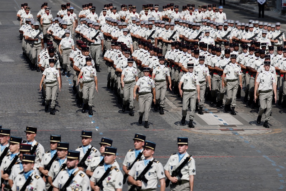 Soldiers from the 503rd Transport Regiment, specializing in force logistics, march during the annual Bastille Day military parade on the Champs-Elysees avenue in Paris (Reuters)