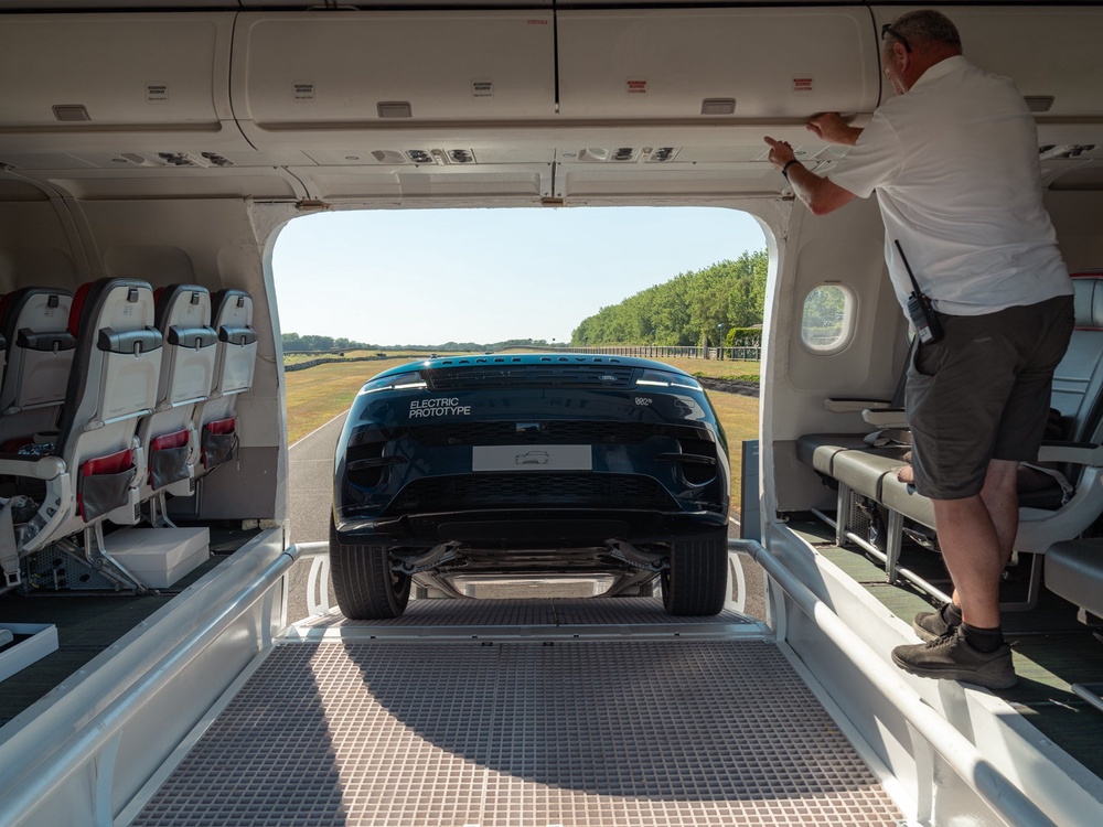 The Range Rover Sport Electric proved its 4x4 credentials at Goodwood by driving through the middle of a wide-bodied jet (Range Rover)