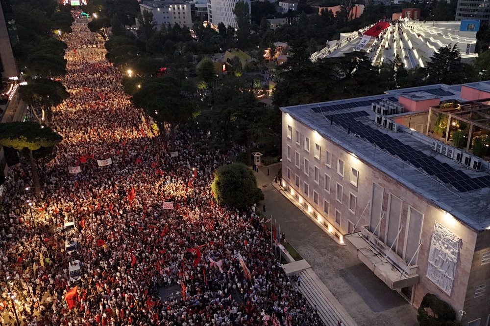 Protesters demonstrate in front of the Albanian Prime Minister's Office against the construction of a luxury resort (AFP/Getty)