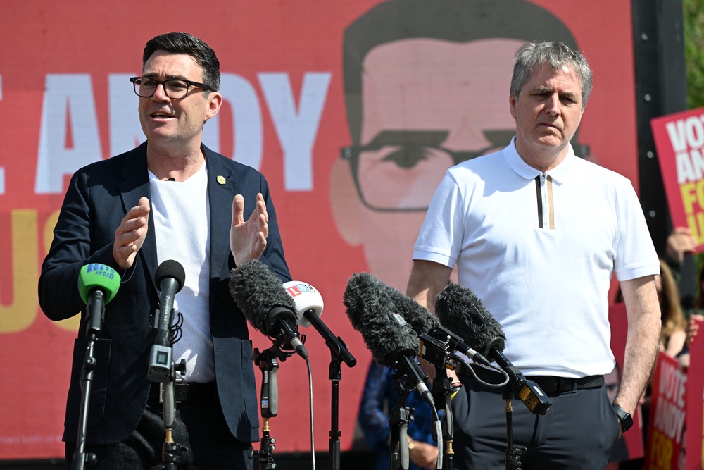 Andy Burnham and Liverpool mayor Steve Rotheram at the launch of his by-election campaign in Ashton-in-Makerfield (AFP/Getty)