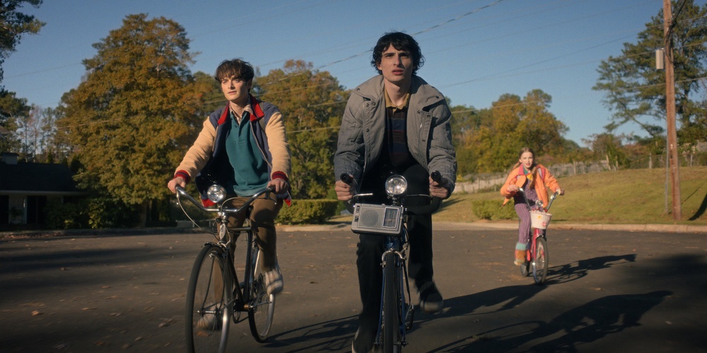 Noah Schnapp as Will Byers, Finn Wolfhard as Mike Wheeler, and Nell Fisher as Holly Wheeler in 'Stranger Things' (Netflix)