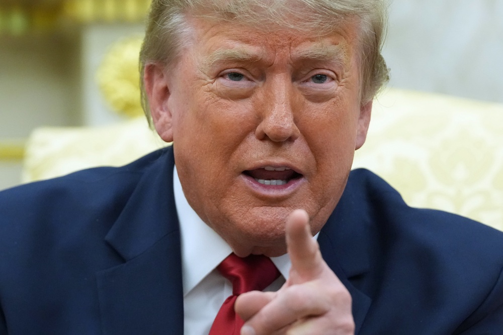 The US president has renewed his threat to target bridges and power plants in Iran (Julia Demaree Nikhinson/AP) (AP)