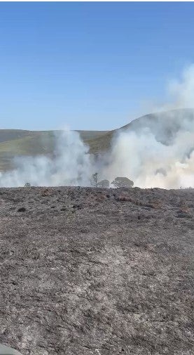 The fire broke out in heathland near Glenmore (Duncan Ferguson/PA)