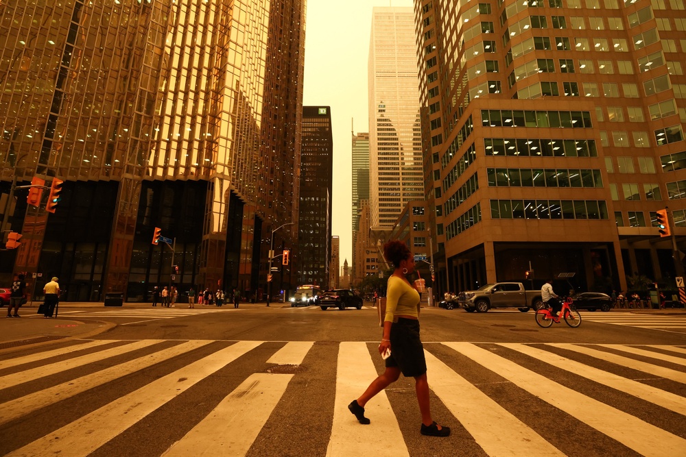 The smoke is expected to spread to large swaths of the Midwest and Northeast U.S. this week, exposing millions of people to dangerous air pollution (AFP via Getty Images)