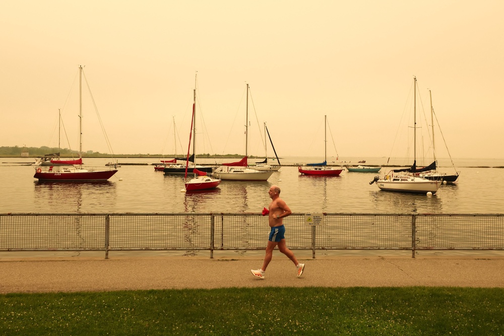 Experts suggest wearing a N95 mask if you have to be outside and keeping your indoor air cleaner by closing windows and running an air purifier or air conditioner (AFP via Getty Images)