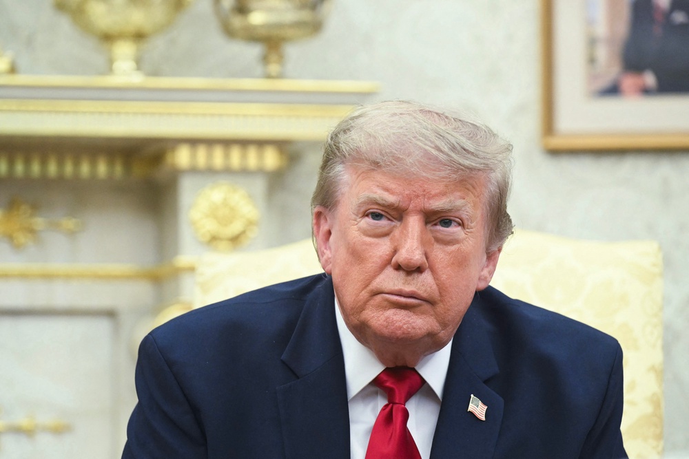 President Donald Trump has canceled an Immigration and Customs Enforcement plan to end traffic stops after two deadly shootings just days apart (AFP via Getty Images)