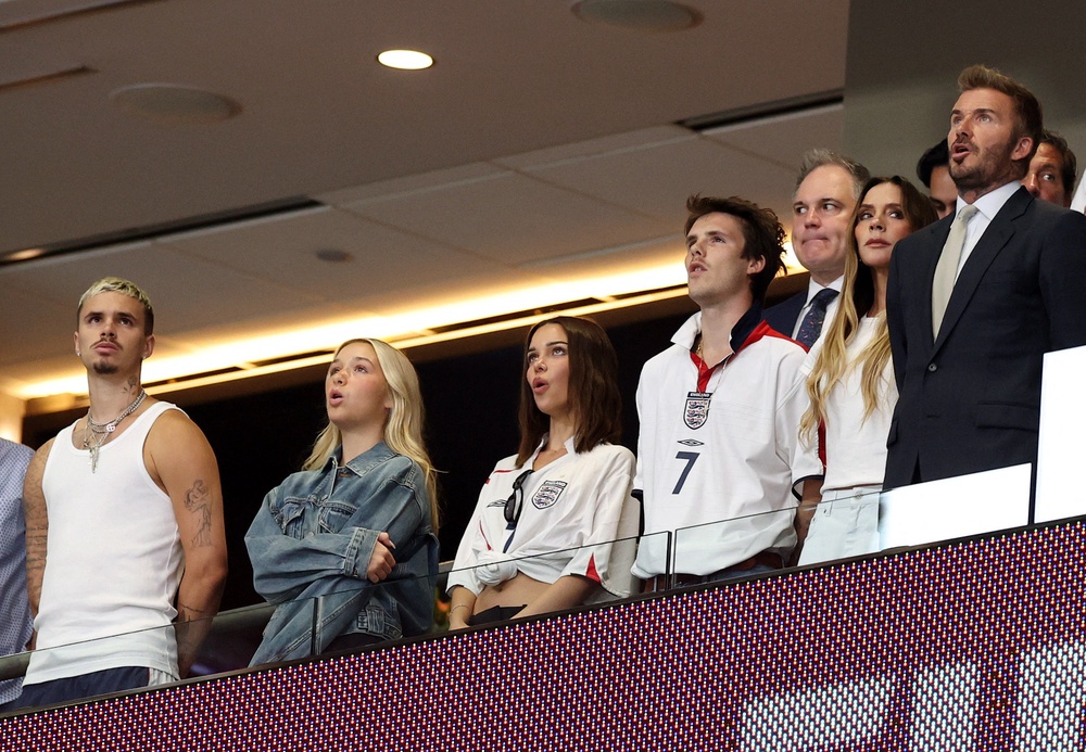 Sir David Beckham is enjoying the game his wife Victoria, sons Cruz and Romeo and daughter Harper (Reuters)