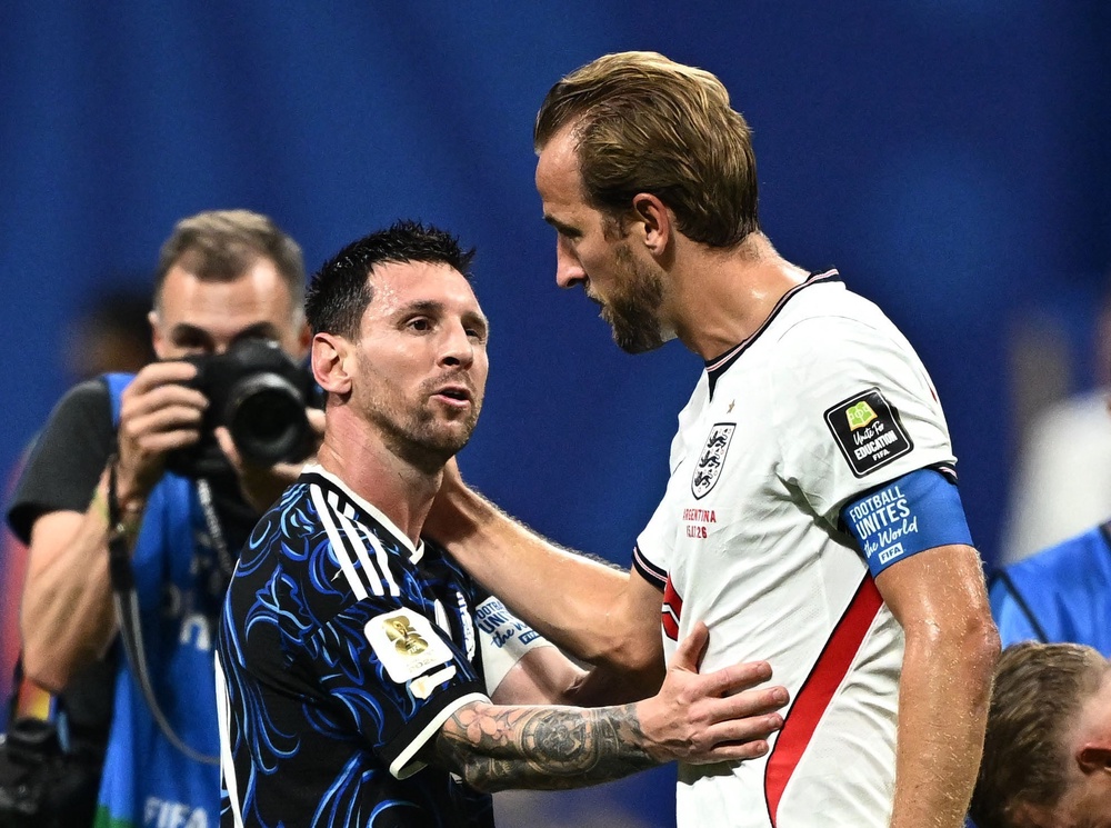 Lionel Messi consoles Harry Kane at the full-time whistle (Reuters)