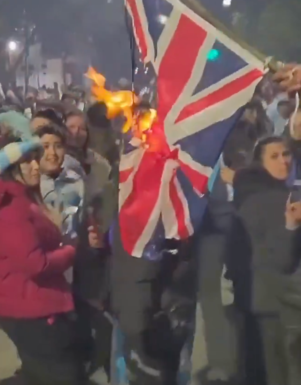 Argentina fans burning the union jack flag ahead of the match (X)