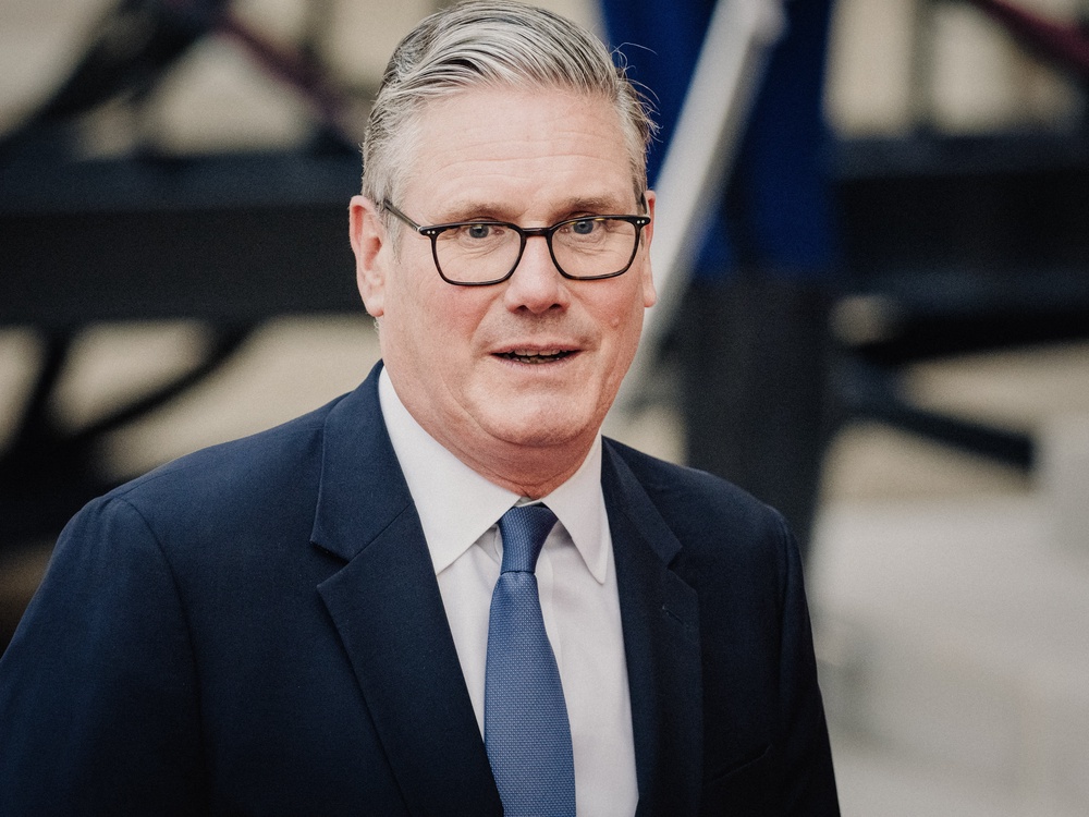 Sir Keir Starmer's official spokesperson hit back after Argentine football players wielded a politically charged banner (AFP/Getty)
