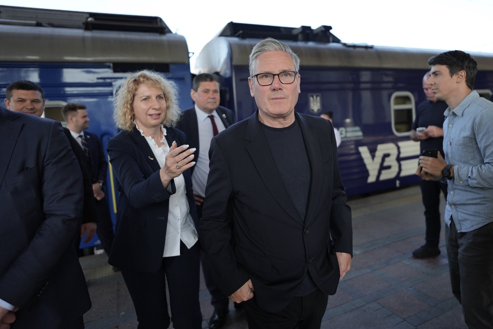 Prime Minister Sir Keir Starmer is welcomed by Ukrainian officials at the railway station in Kyiv (Stefan Rousseau/PA) (PA Wire)