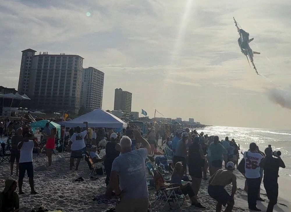 The Trump administration has made a point of praising military pilots accused of unsafe maneuvers, including a recent beach flyby from a member of the Blue Angels demonstration team (Partridge Drones/Facebook)