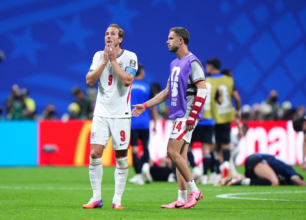 England’s Harry Kane and Jordan Henderson after the World Cup semi-final match (Bradley Collyer/PA) (PA Wire)