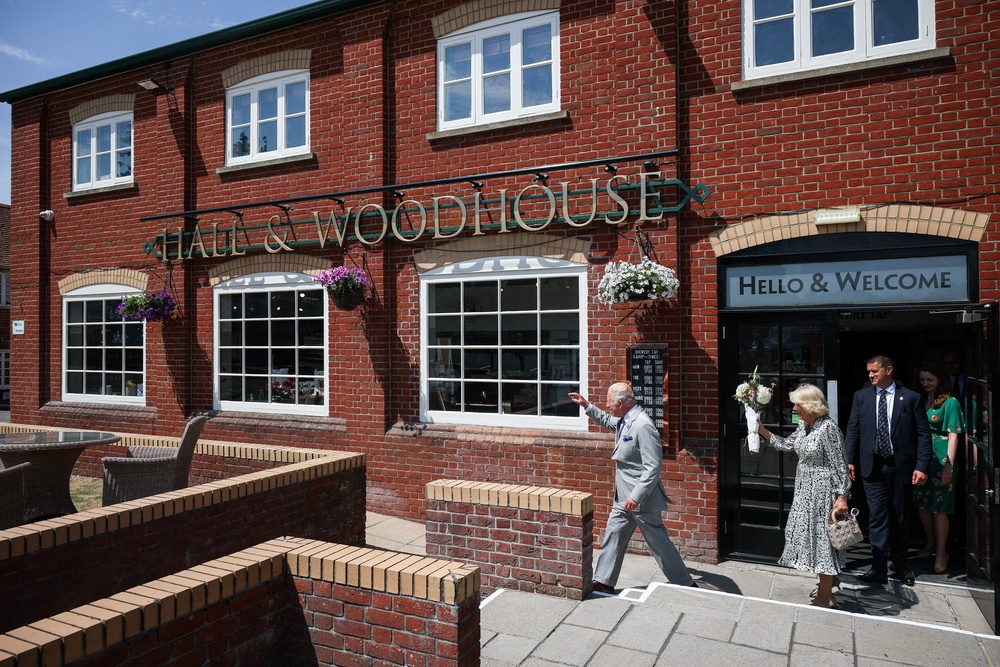 The King and Queen during a visit to the Hall and Woodhouse Badger Brewery in Blandford St Mary near Blandford Forum, Dorset (Isabel Infantes/PA) (PA Wire)