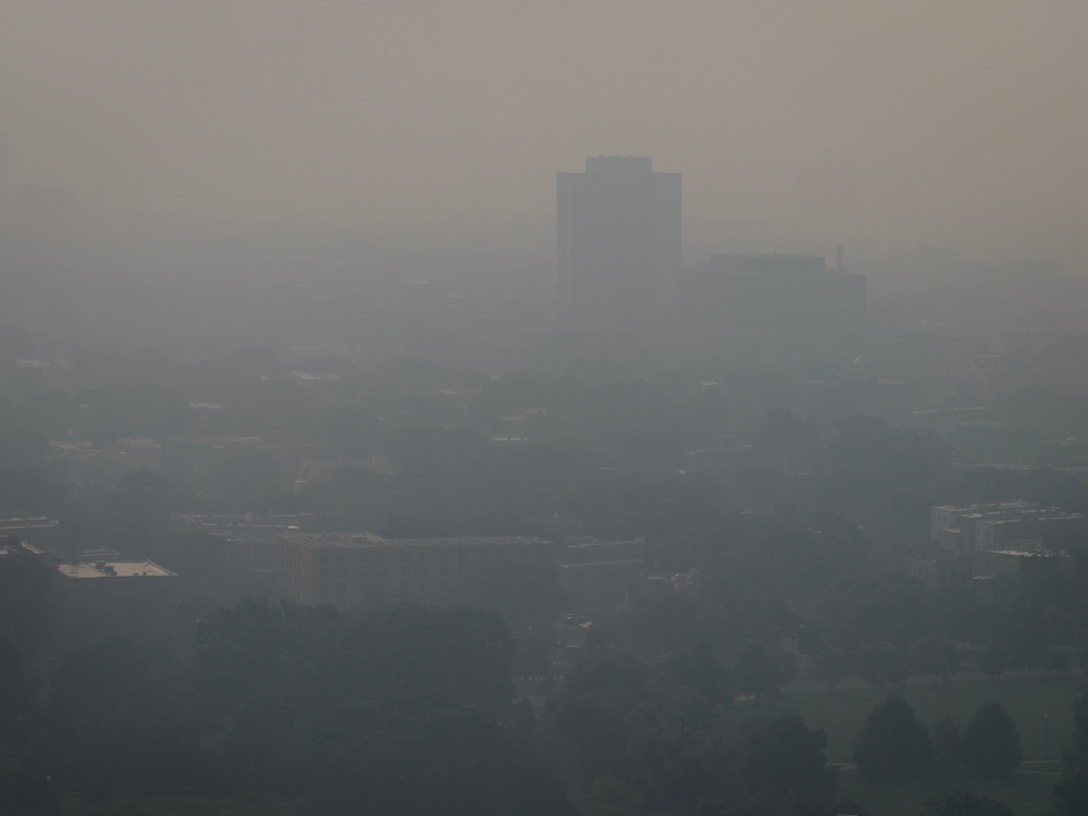 An aerial view shows smoke from Canadian wildfires over Chicago, Illinois, on Thursday. Wildfire smoke can bring decreased visibility that impacts transportation (Getty)