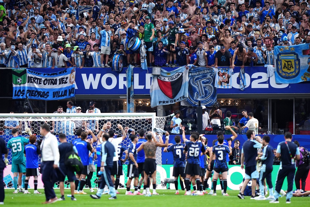Argentina players celebrate with their fans following the semi-final win (Bradley Collyer/PA)