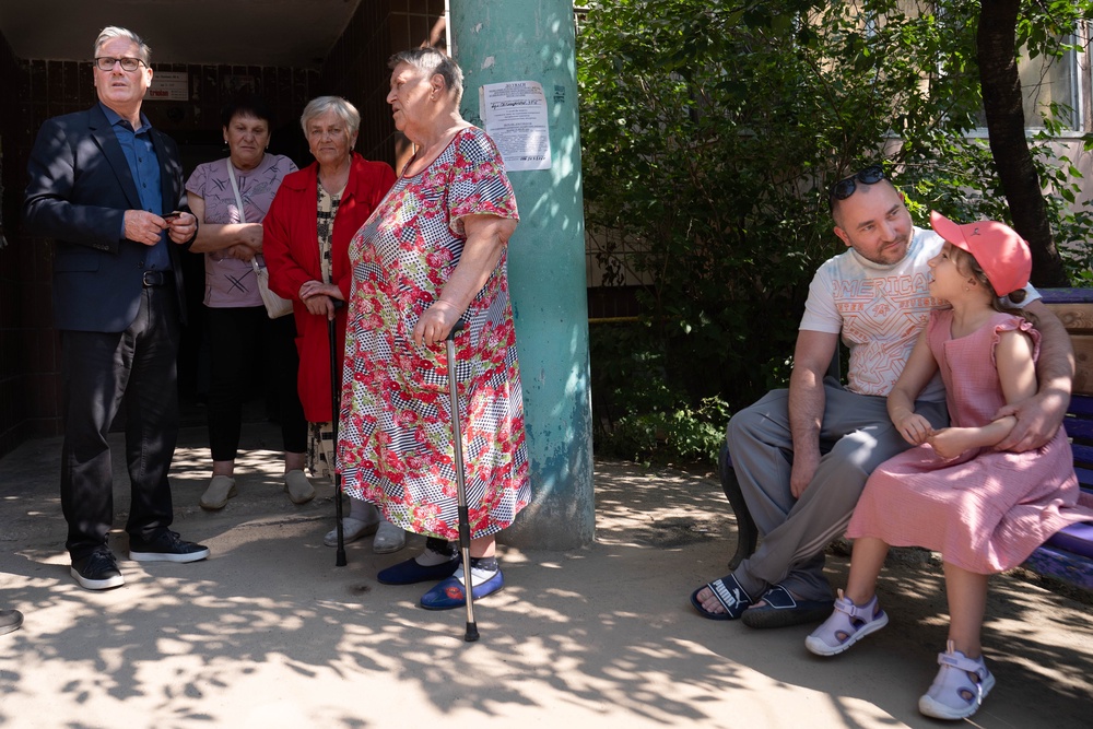 Prime Minister Sir Keir Starmer meets residents in the Podilskyi area of Kyiv which was hit by multiple Russian missile strikes (Stefan Rousseau/PA) (PA Wire)