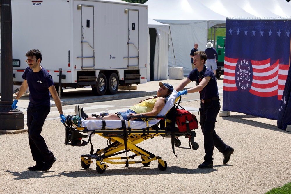 A person is helped by first responders along the National Mall in Washington, D.C., earlier this month. Heat is responsible for 2,000 deaths each year (AFP/Getty)