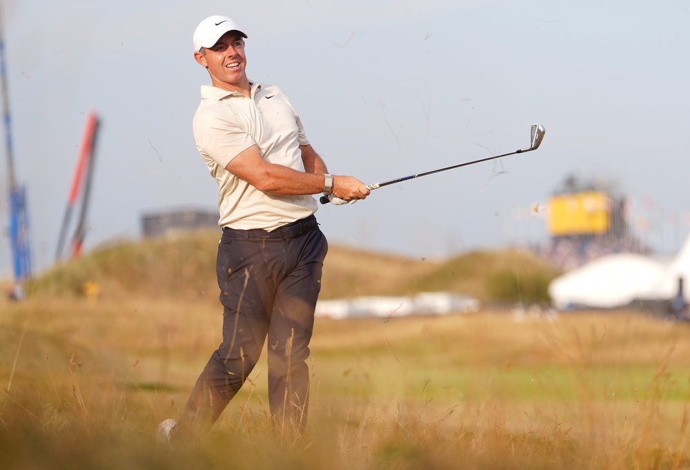 McIlroy still feels he has a chance to win despite being seven shots behind the leader (PA)