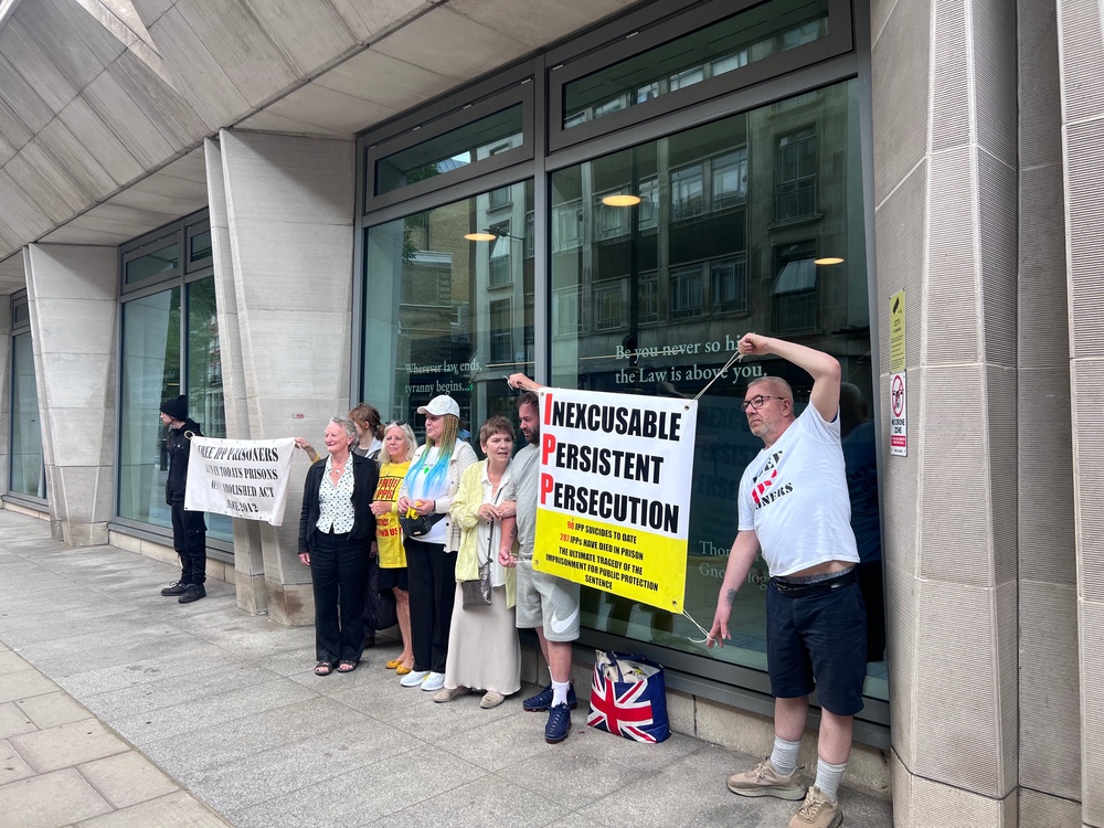 Families of IPP prisoners and campaigners outside the Ministry of Justice (The Independent)
